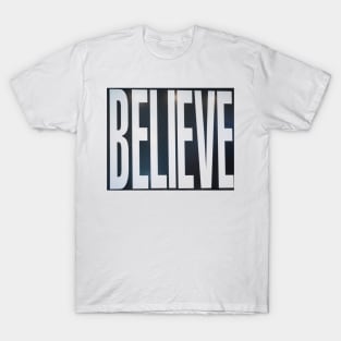 Believe, white lettering on black. T-Shirt